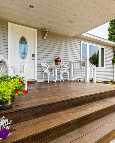 Bay view through large windows of a Northern Michigan vacation home